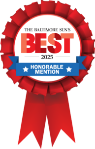 A red ribbon award badge reads "The Baltimore Sun's Best 2025 Honorable Mention" with a blue banner and white stars.